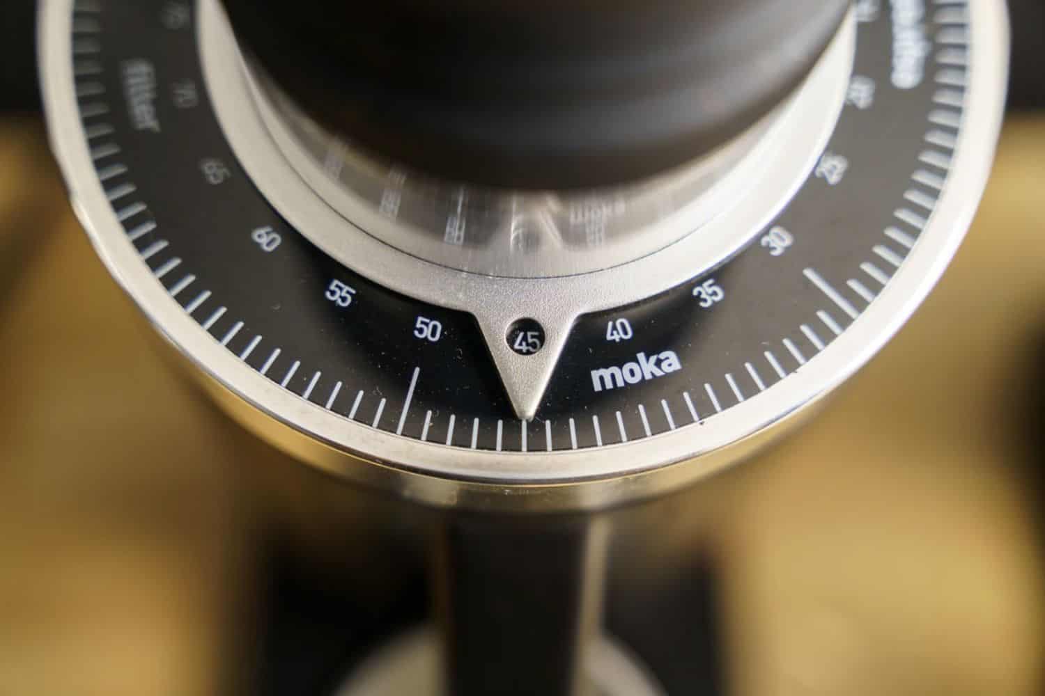 Close-up of a DF64 Gen 2 adjustment dial with a blurred background