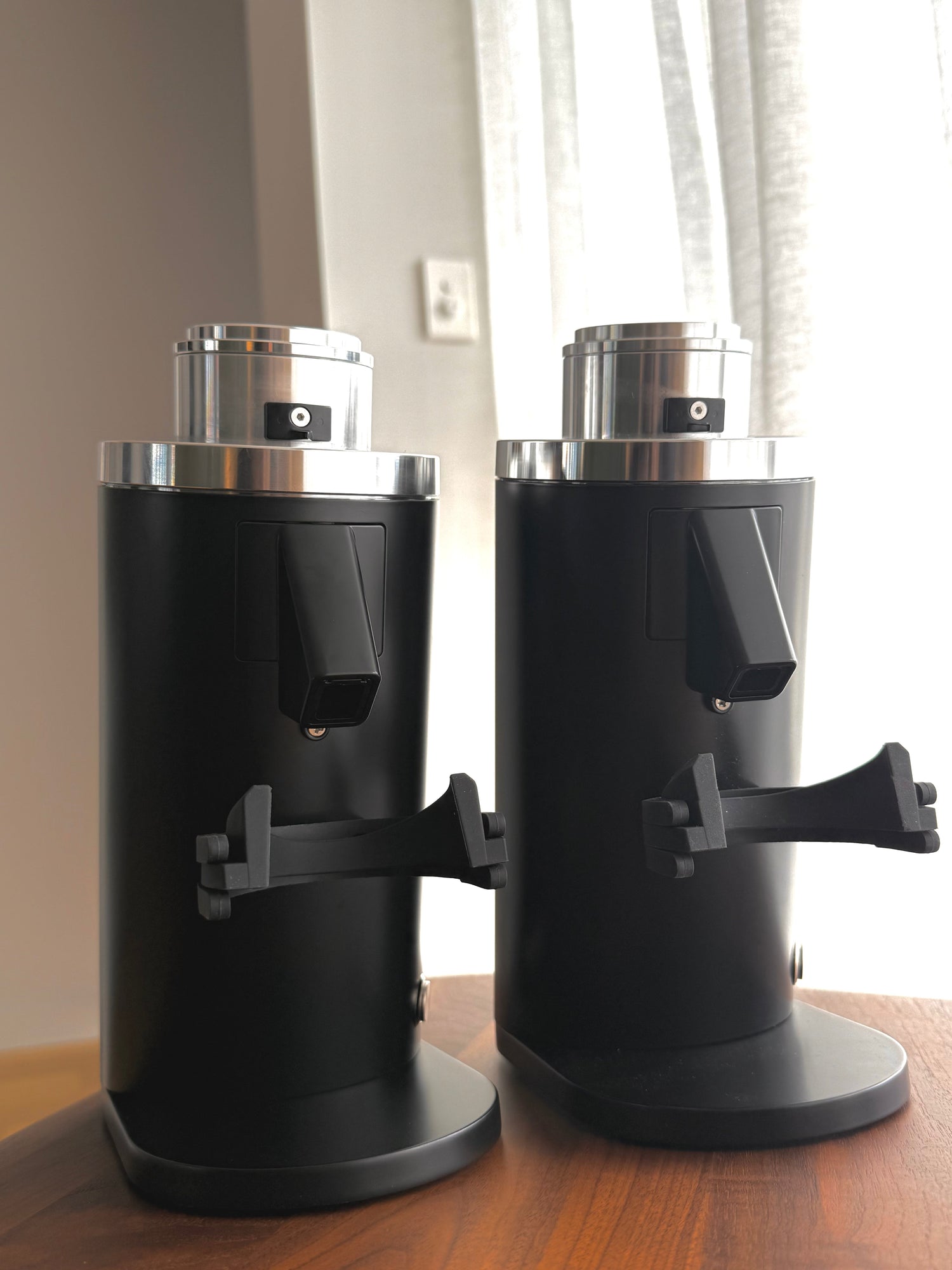 DF54 V4 on the left and DF54 V3 on the right, showing the wider V4 exit chute - Grind Logic