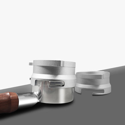 Silver 54mm twist-lock dosing funnel attached to a compatible Breville portafilter - Grind Logic
