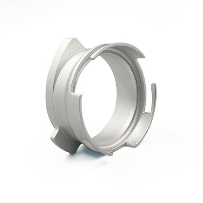 Black 54mm twist-lock portafilter dosing funnel shown from an angled side view - Grind Logic