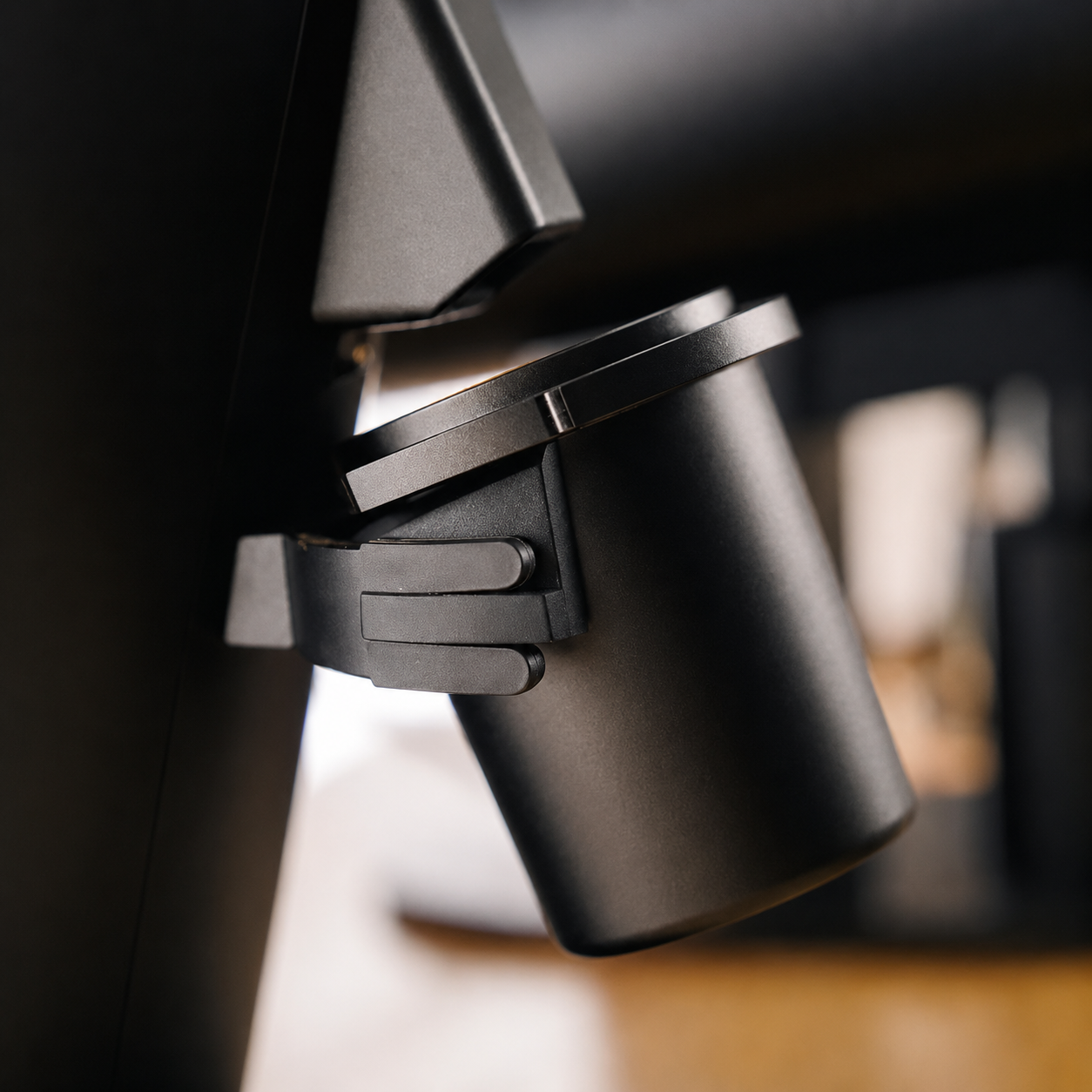Closeup anodised black aluminium dosing cup on DF64 Coffee Grinder
