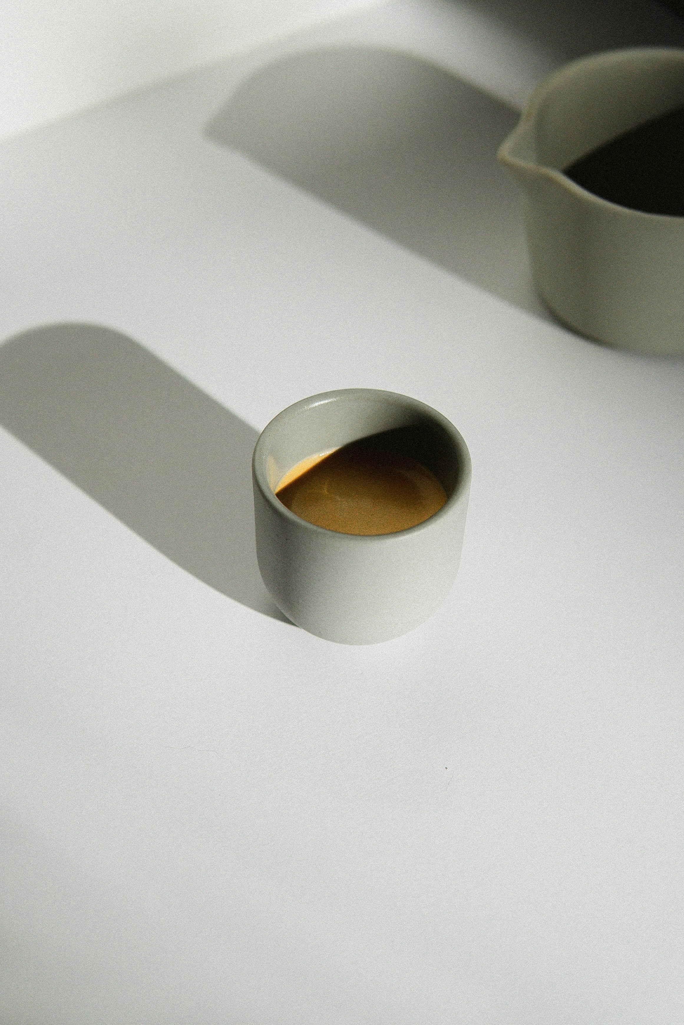 Coffee in Coffee cup against white background 