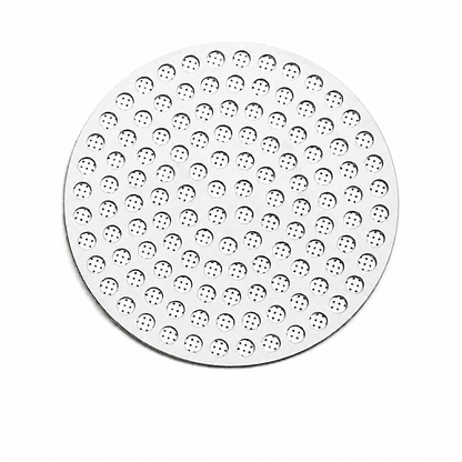 Top view of a perforated stainless steel espresso puck screen on a white background - Grind Logic