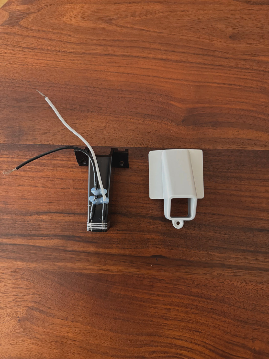 White replacement exit chute, DF54 Coffee Grinder on wooden surface